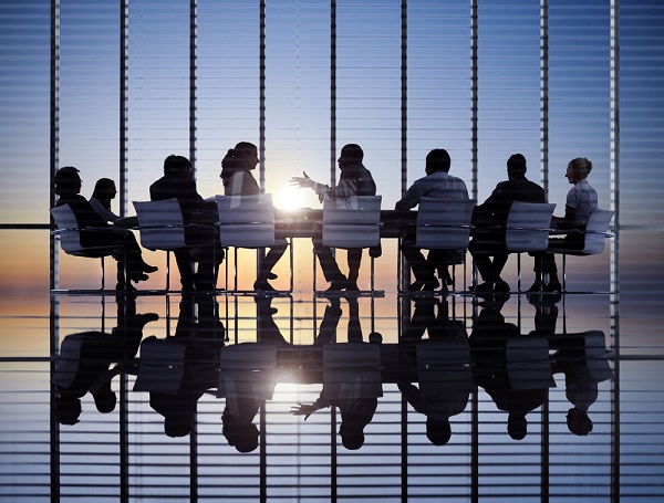 Agents at conference table