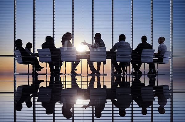 Agents at conference table